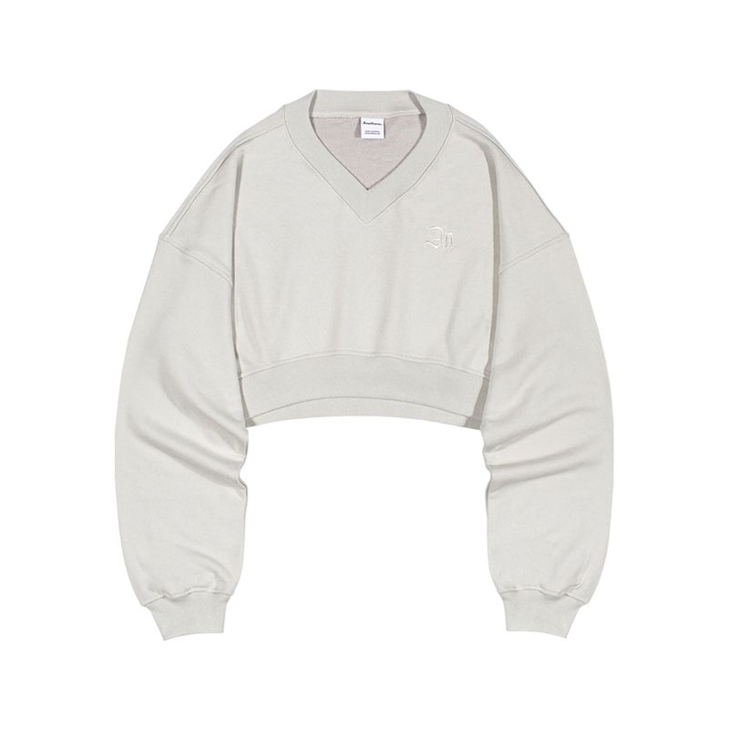 ANOTHERA(アナザーエー)の「V-NECK CROP SWEATSHIR (Ivory)(Tops)」