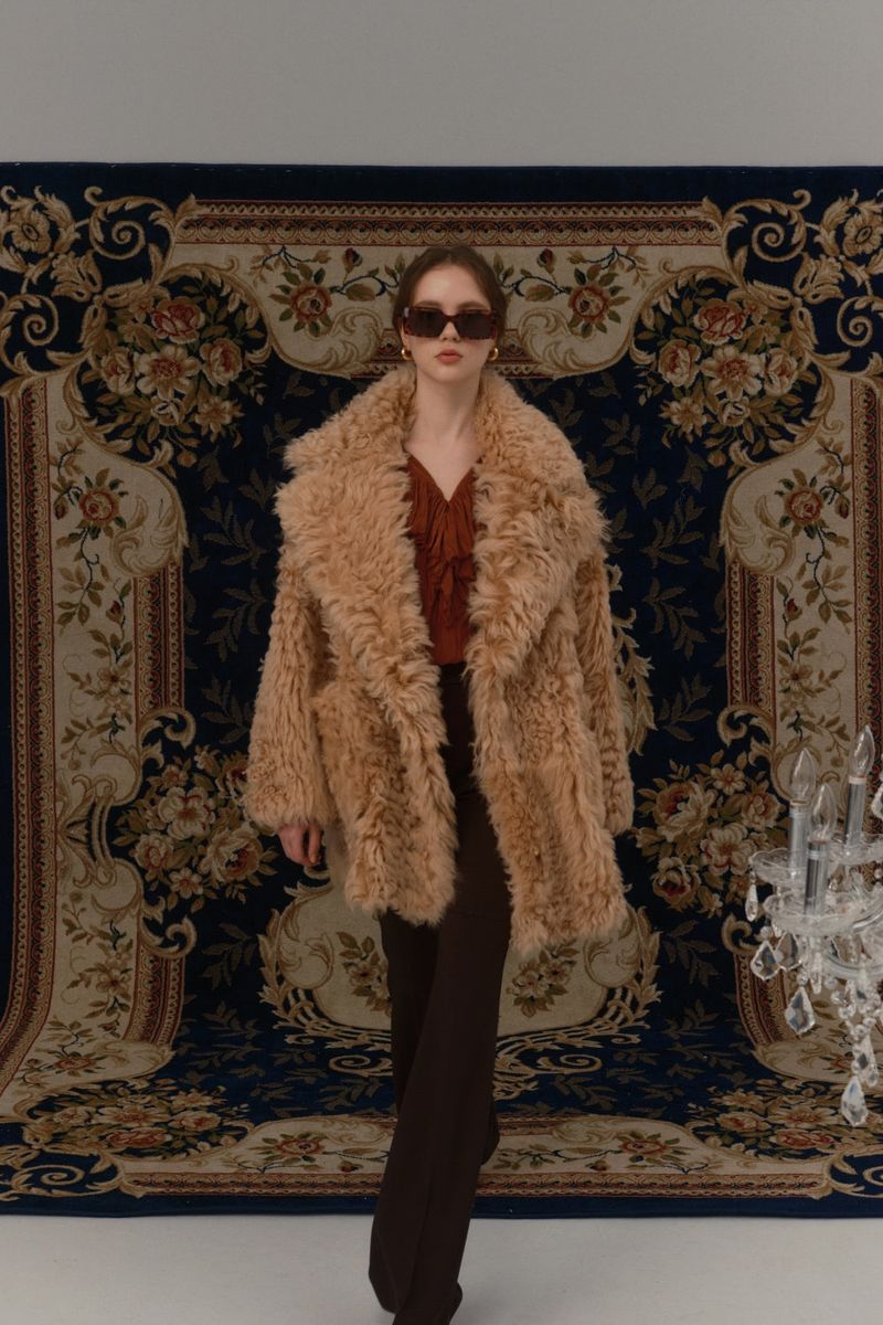 Reversible shearling coat