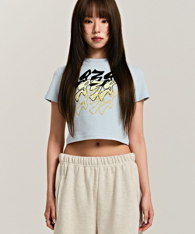 ARCHIVE BOLD（アーカイブボールド）の「939 SMASHED LOGO CROP TOP (SKY BLUE)（Tops）」