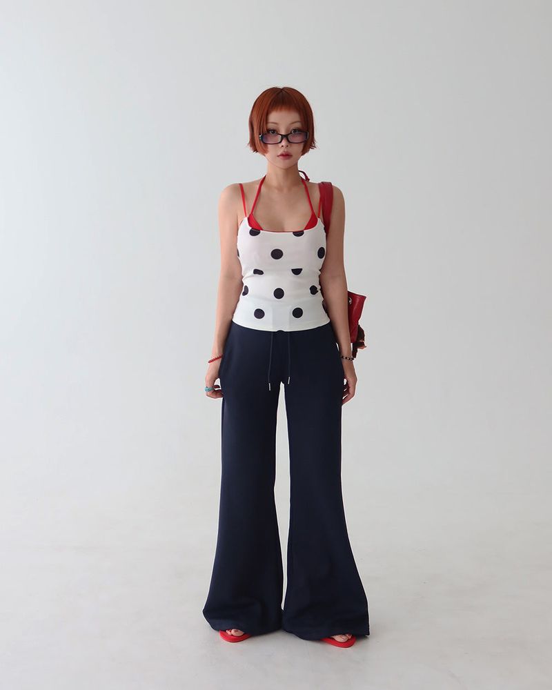 Red colored royal dot sleeveless shirt