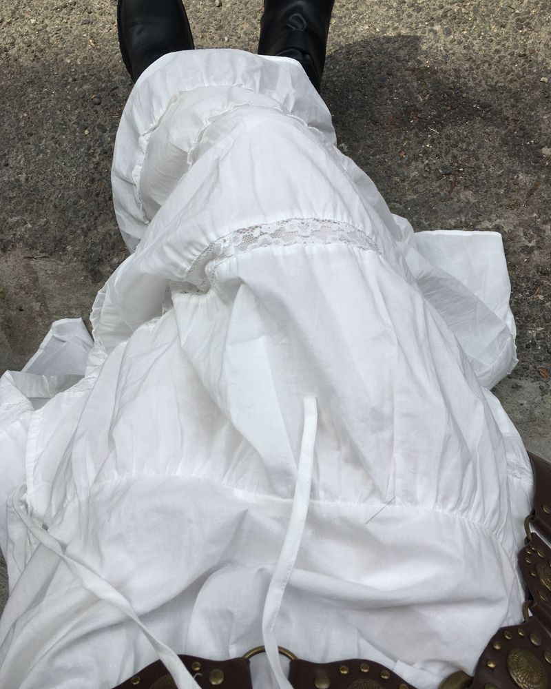 Cutting white long skirt