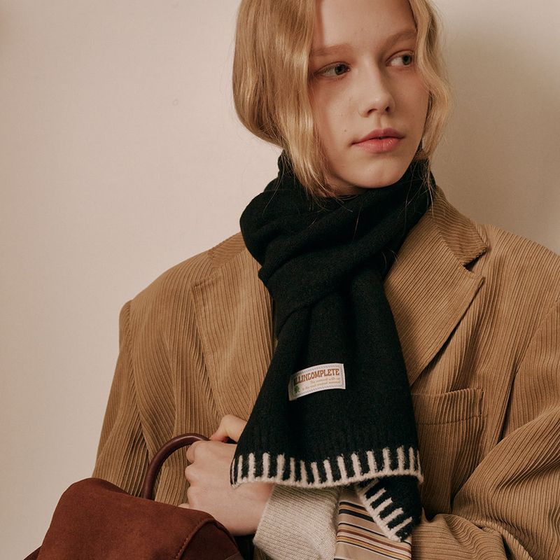 ALLINCOMPLETE（オールインコンプリート）の「Piano Knit Muffler (Black)（Fashion Accessories）」
