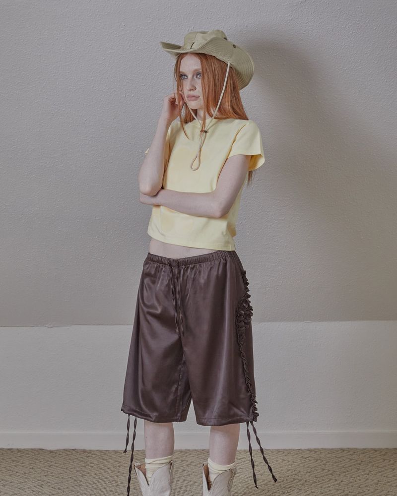satin ruffle track pants / brown