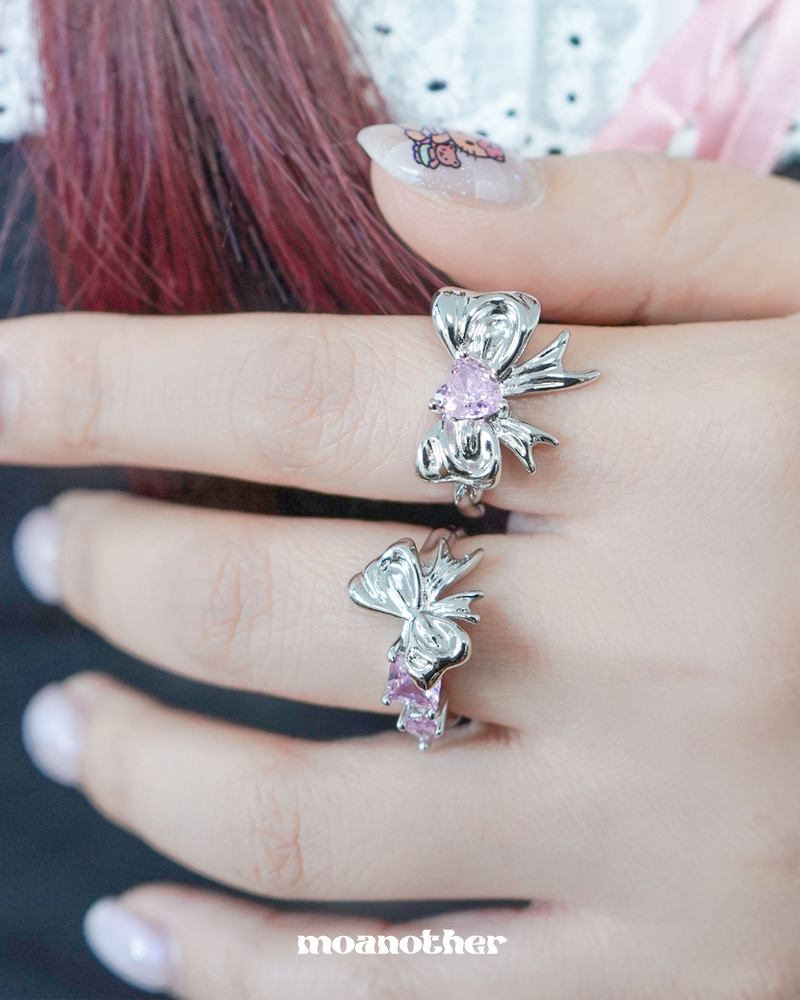 moanother（モノアザー）の「[Hearts2Hearts Stella, IDLE Minnie Pick!] Ribbon Pink Hearts Cubic Open Ring（Accessories）」