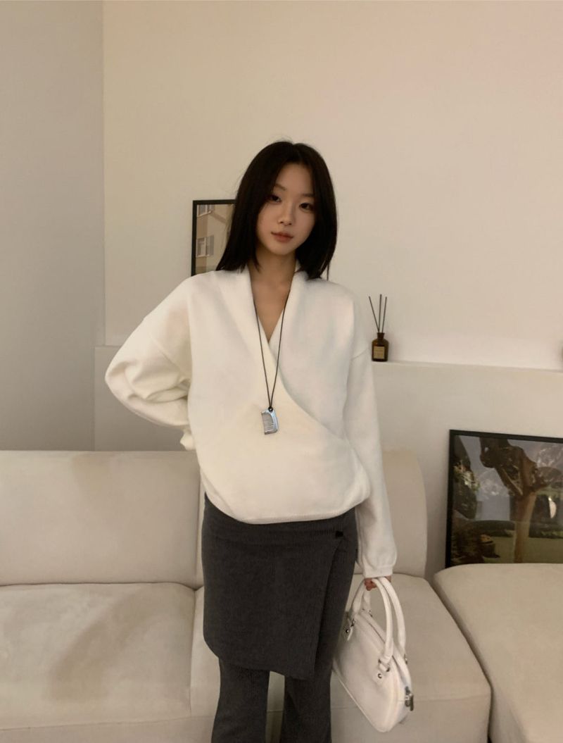 Melli Loose-Fit Wrap V-Neck Hidden Snap Knit Top
