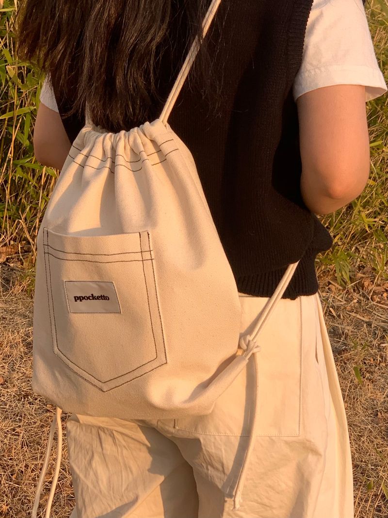ppocketto ivory string bag