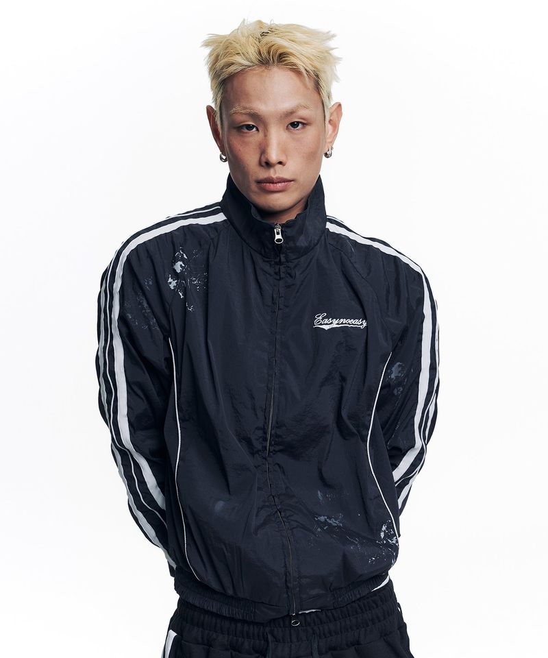 EASY NO EASY（イージーノーイージー）の「Dirty Nylon Piping Track Jacket - Black（Jackets/Outerwear）」