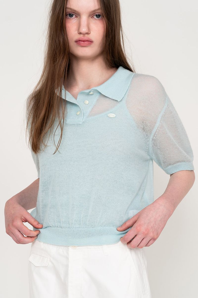 THEOHYOU（ザオユ）の「SEE-THROUGH COLLAR HALF KNIT (SKY BLUE)（Tops）」