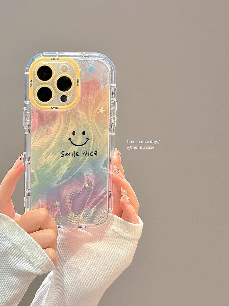 CLAIT AOUF(クレイト アウフ)の「レインボースマイリーフェザースマホケース for iPhone 16 Pro Max(スマホグッズ/小物)」
