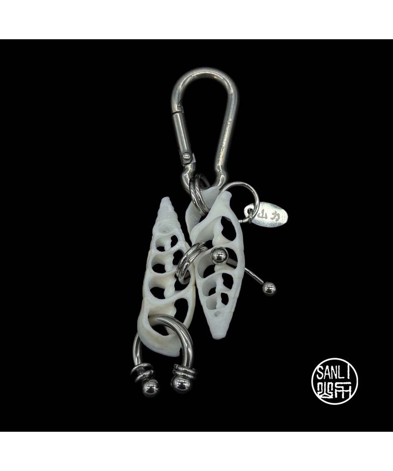 shell piercing keyring