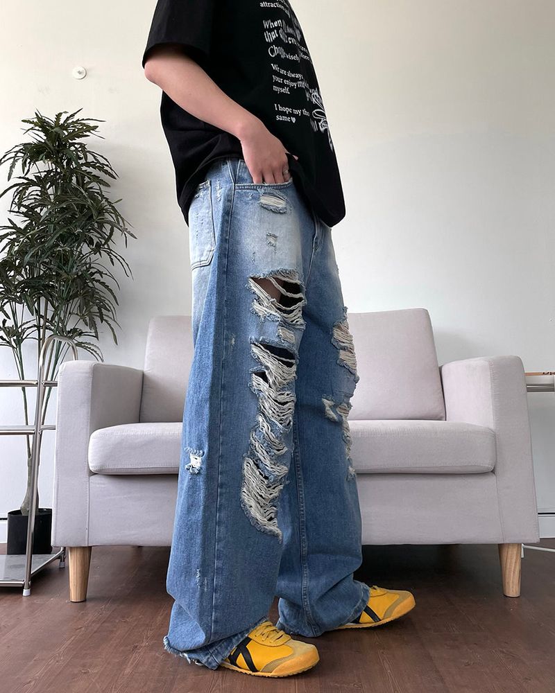 Destroyed brush denim pants