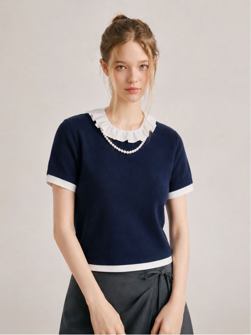 TWEEDY-A（ツウィーディア）の「セリーパールフリルリンガーハーフTシャツ ネイビー（トップス）」