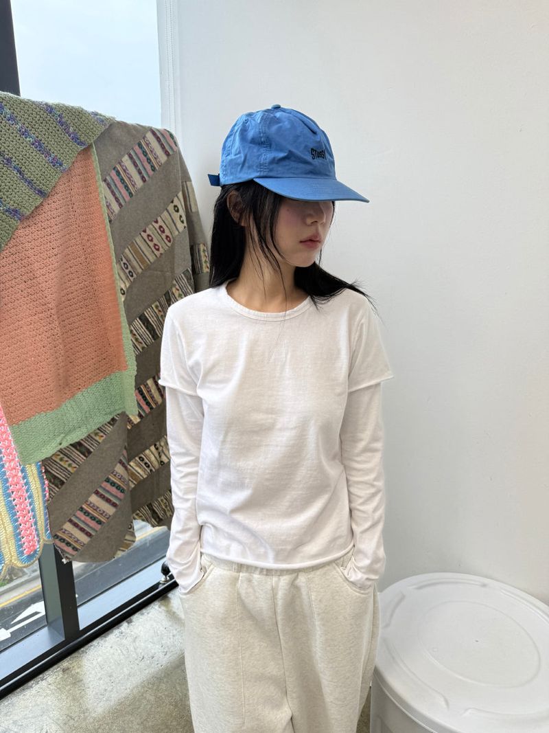 another language（アナザーランゲージ）の「カットアウトレイヤードTシャツ（トップス）」
