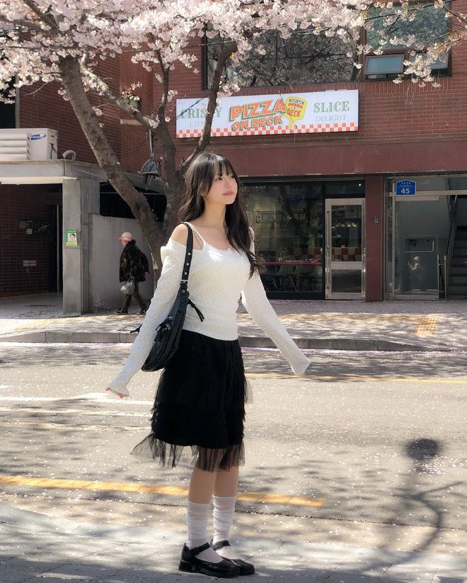 ヘミングリブレースボタンスリーブレストップ