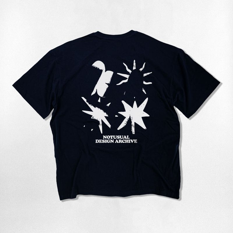 NOTUSUAL（ノットユージュアル）の「グランジシンボルオーバーフィットTシャツ - 4COLOR（トップス）」