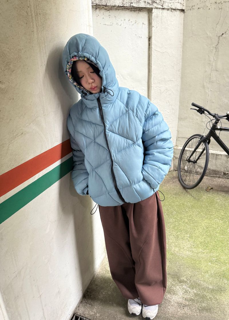 cross padding jumper