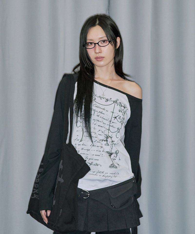 ODDSTUDIO（オッドスタジオ）の「Cross Ornament Off Shoulder Raglan Long Sleeve - WHITE（Tops）」