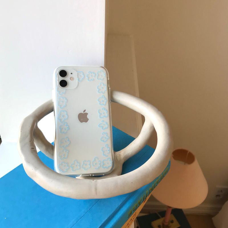 jjehouse（ジェイジェイハウス）の「ポップコーンフラワースマホケース (clear)（スマホグッズ/小物）」