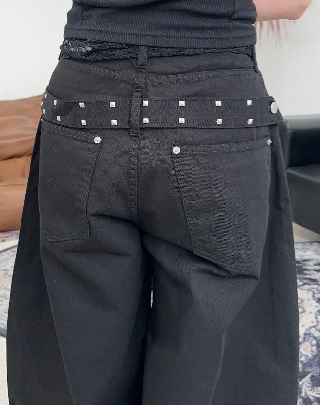 Pale studded strap pants