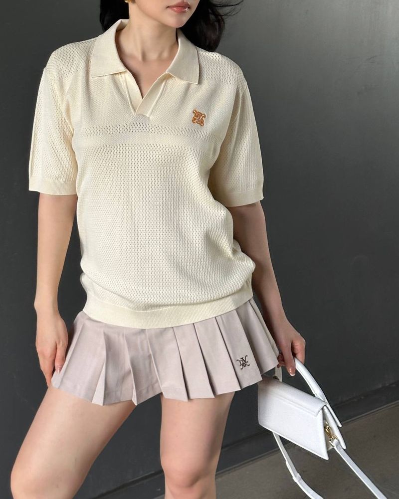 DVRK（ダーク）の「DVRK プリヴェボタンレスポインテールニッティドポロ - CREAM（トップス）」