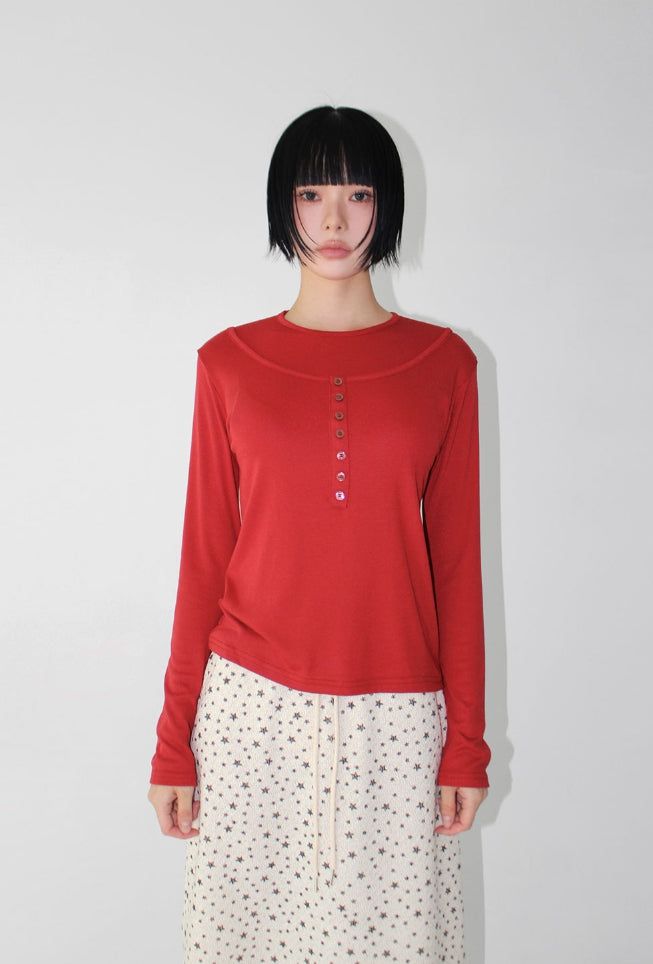 AAKE(アケ)の「LAYERED BUTTON LONGSLEEVE(Tops)」