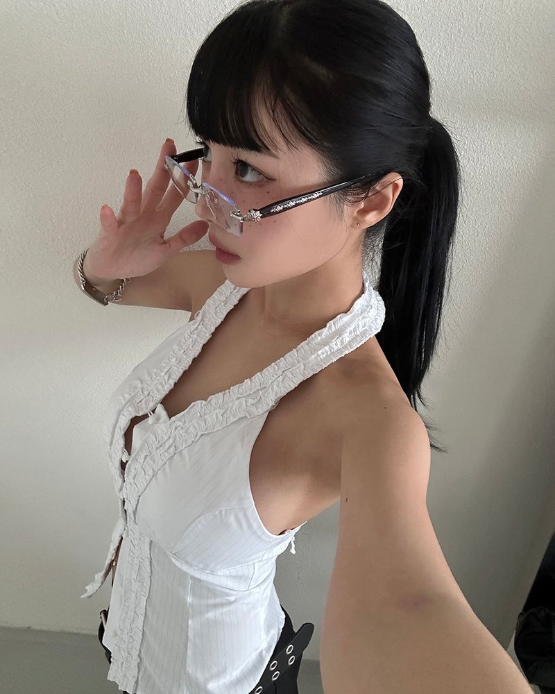 chrome cross-rimmed glasses