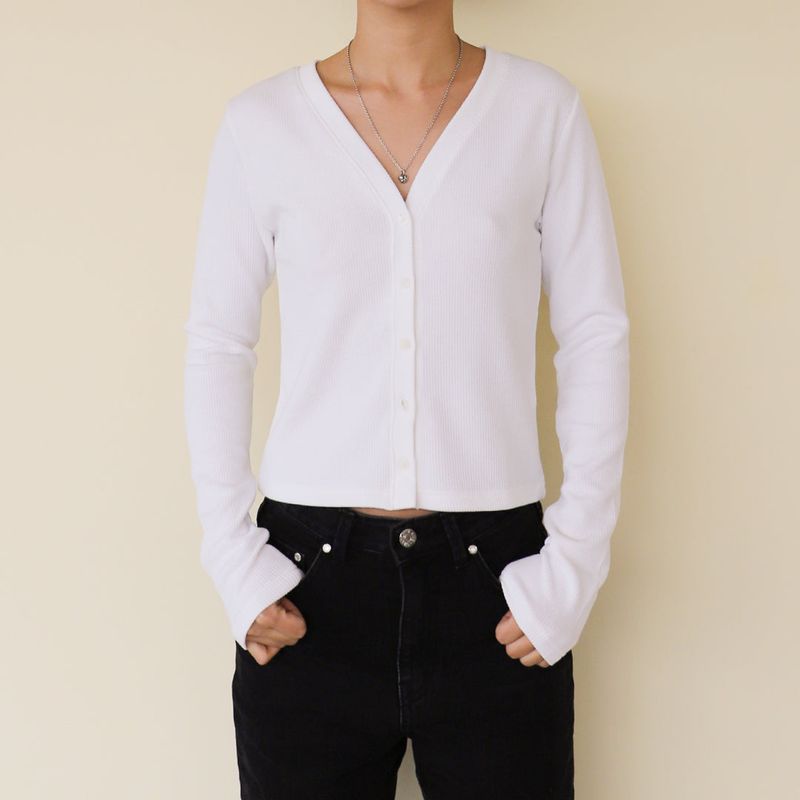 KRUCHI（クルチ）の「GREEDY CROP CARDIGAN (WHITE)（）」