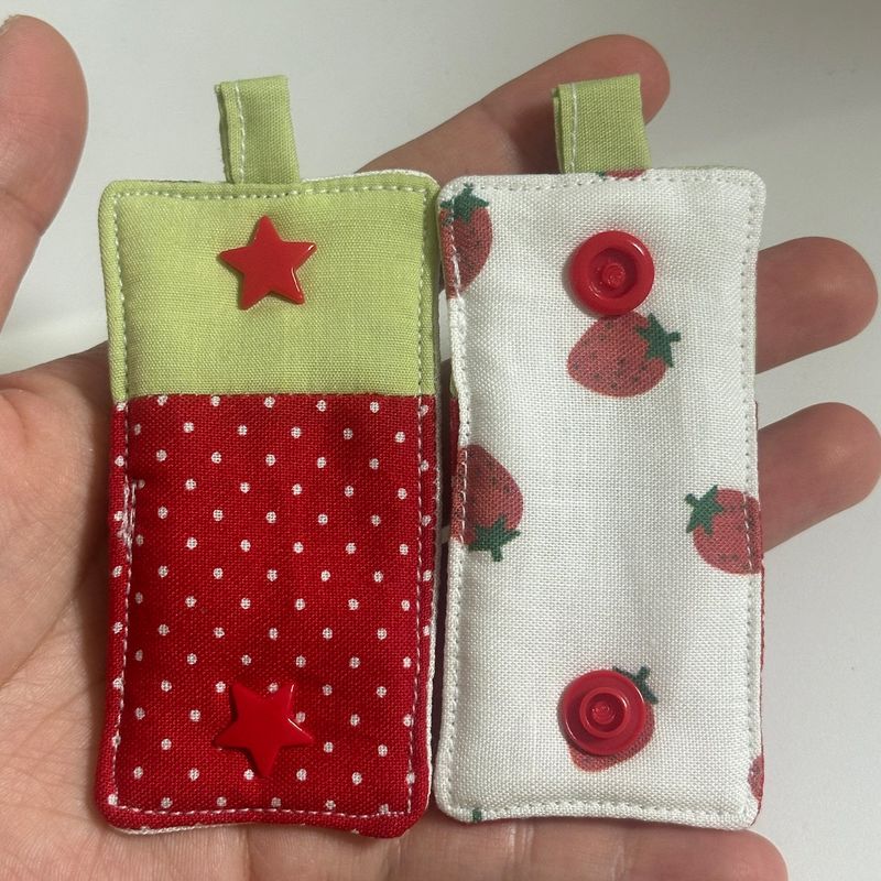 I like strawberries! Earphone holder