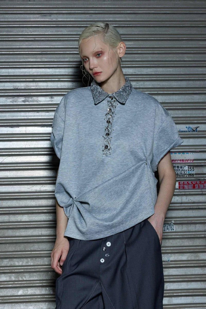 Argue Cultureの「Sequin Safety Pin Polo Tee(Tops)」