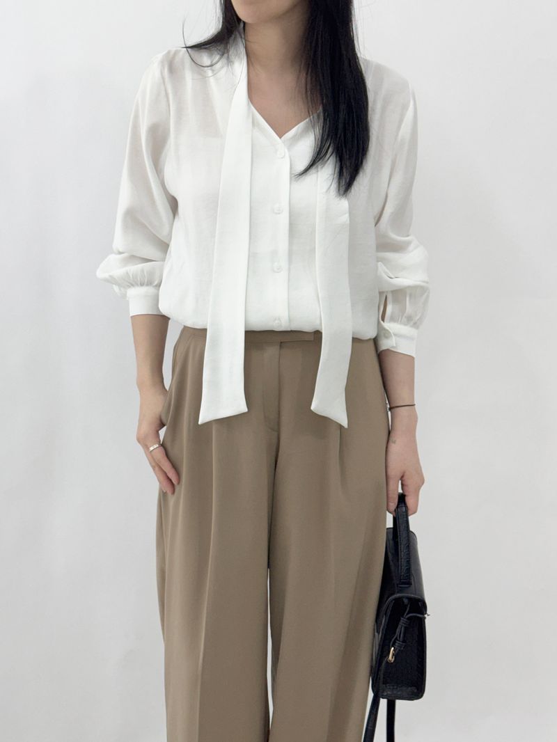 Bleak tie button long-sleeve blouse