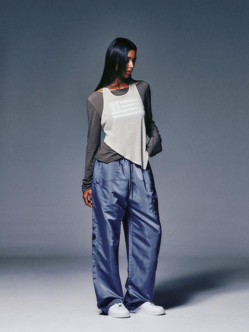 NYXX（エヌワイエックスエックス）の「P.O.M EMBLEM JOGGER PANTS (LIGHT BLUE)（Pants）」