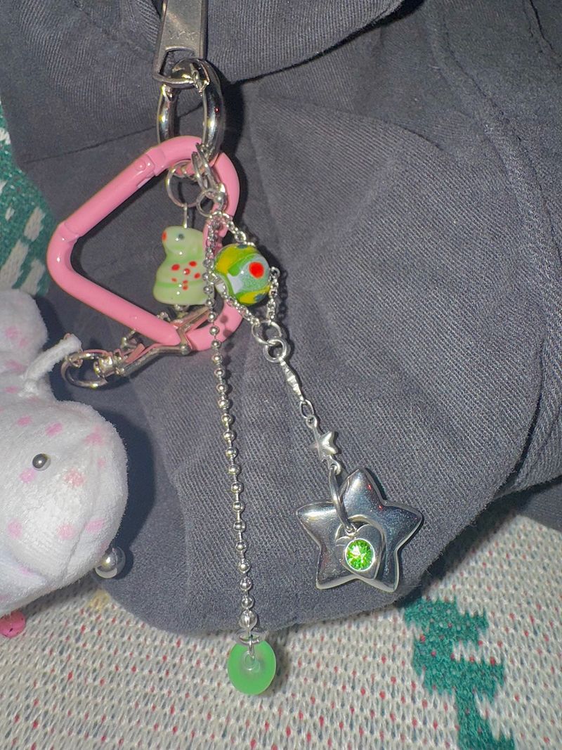 Pierced pinky cow keychain