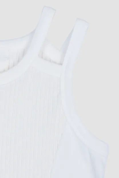 ASYMMETRIC RIB TANK