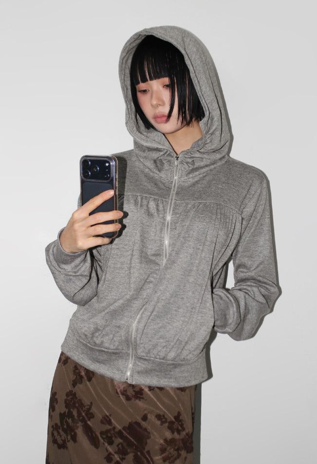 AAKE（アケ）の「SHIRRING HIGH NECK ZIP-UP（Tops）」