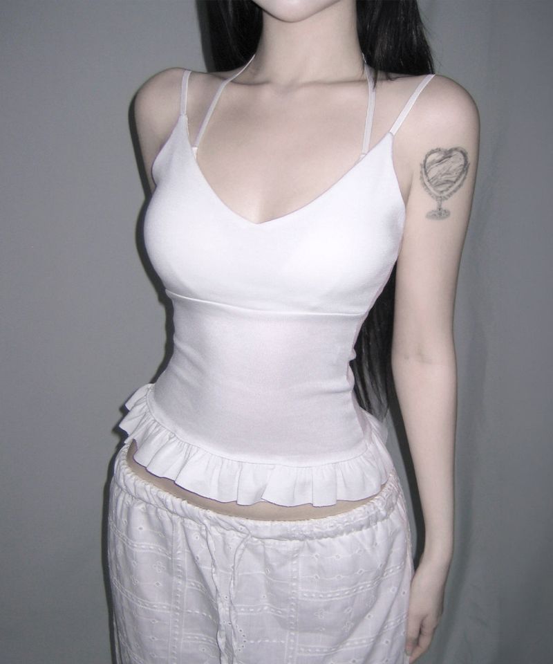 meego（ミーゴ）の「ivy frill top (3colors)（Tops）」