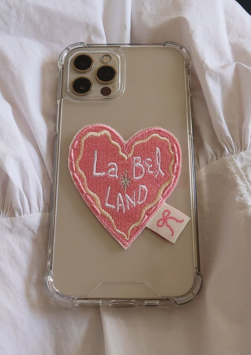 LabelLand(ラベルランド)の「HEART LABEL PHONECASE (PINK)(Smartphone Accessories)」