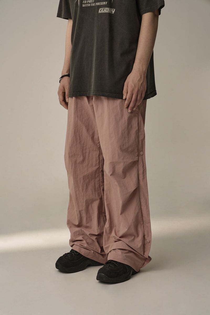 LINE COVER PARACHUTE PANTS (PINK)