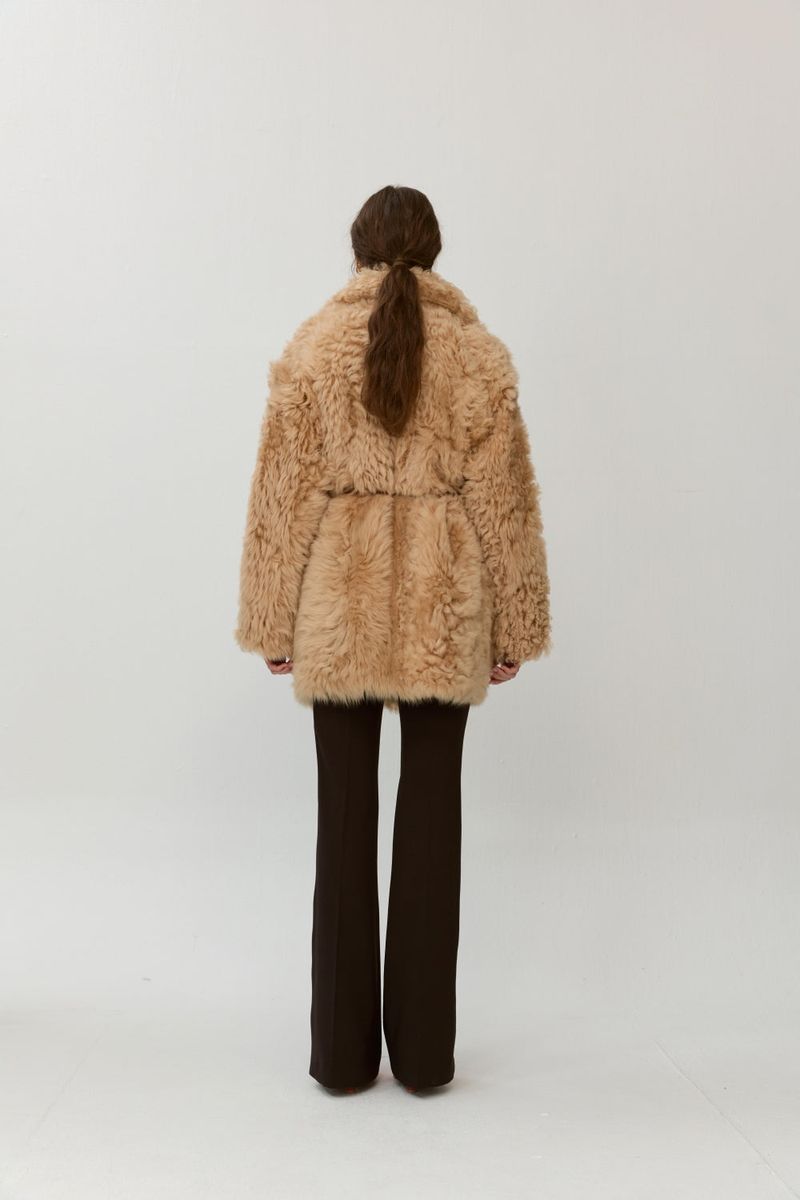Reversible shearling coat