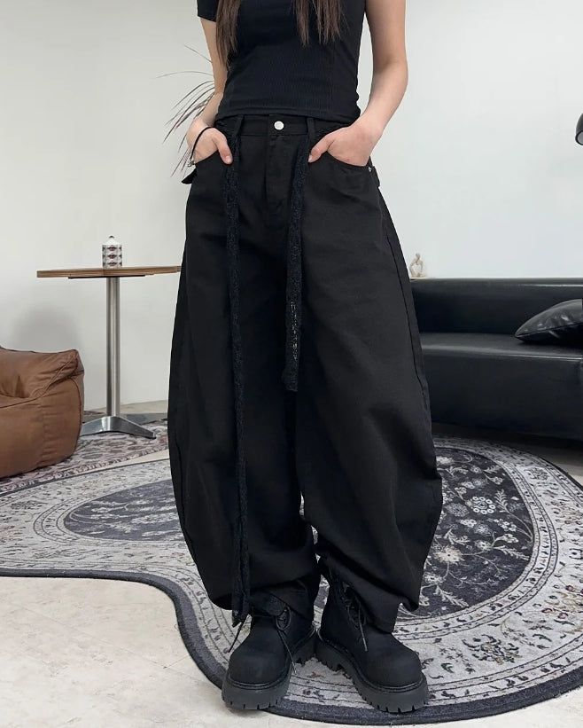 Pale studded strap pants