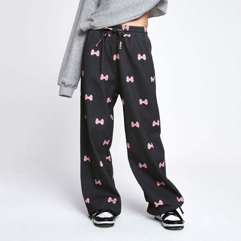 wonder visitor（ワンダービジター）の「Ribbon pattern Jogger pants [Black]（Pants）」