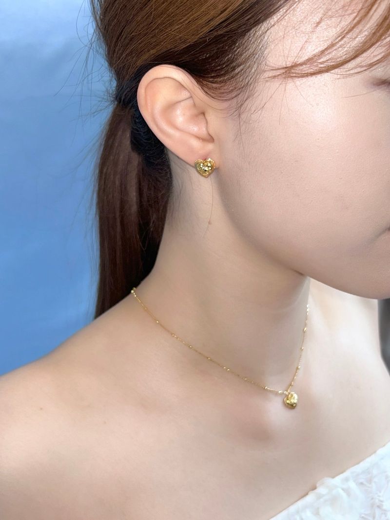 DANI（ダニ）の「Ribbon Heart E (14K Plated)（Accessories）」
