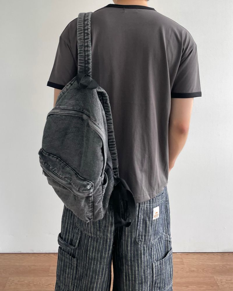 Washed denim backpack