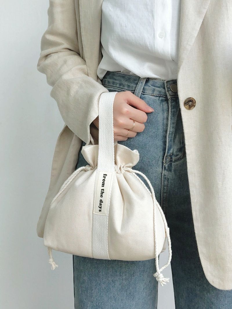 FROM THE DAYS（フロム ザ デイズ）の「【MADE】Canvas Pouch Bag - Ivory（Bags）」