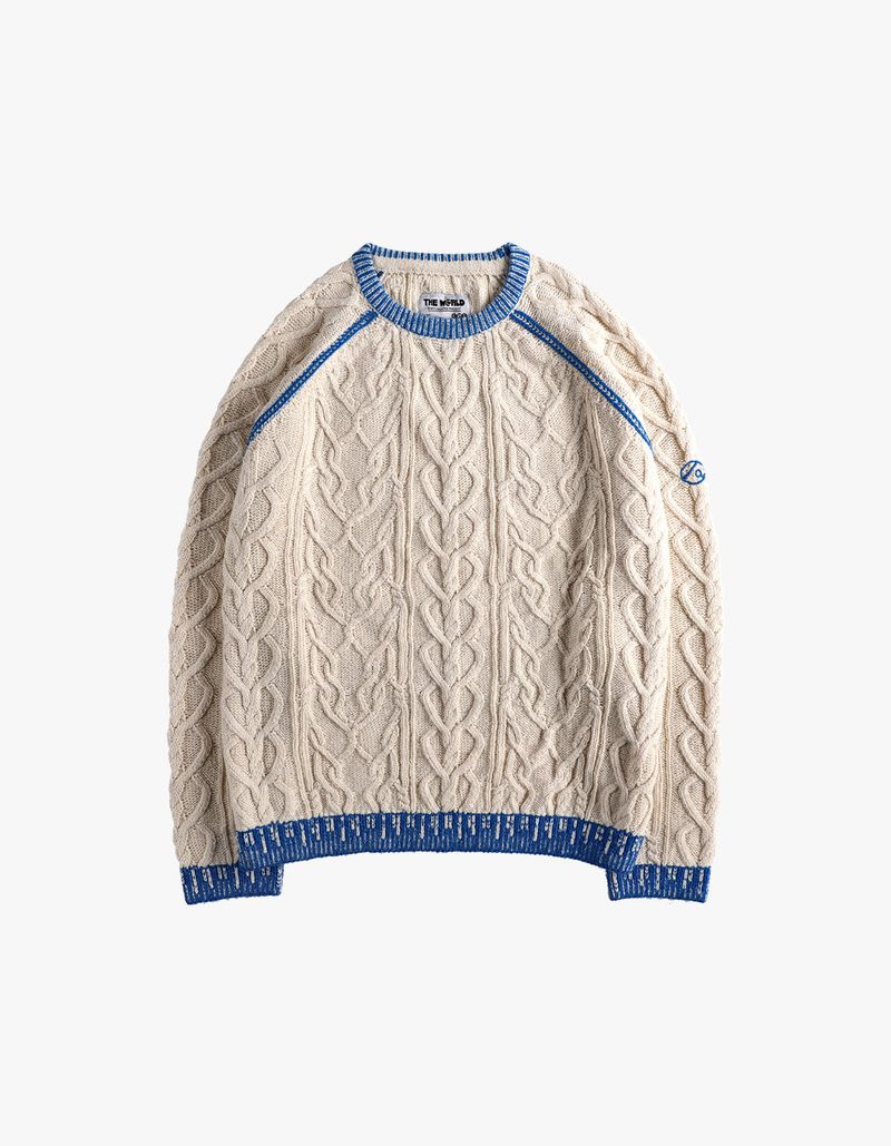 thewarld（ザワールド）の「刺繍ロゴセーター アイボリー/ブルー（トップス）」