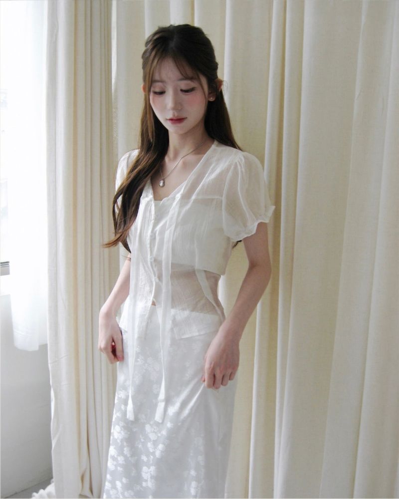 cloudemotion（クラウドエモーション）の「inua wrinkle chiffon & puff tie bl（Tops）」