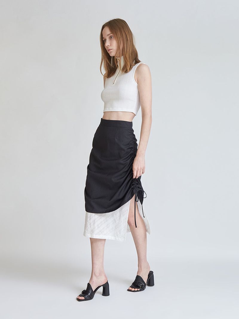 LO AXUAL（ロエクシュアル）の「SHIRRING LAYERD LONG SKIRT（Skirts）」