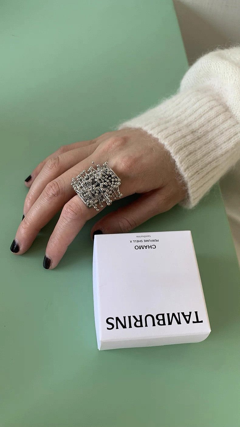 Bold silver line ball tassel ring