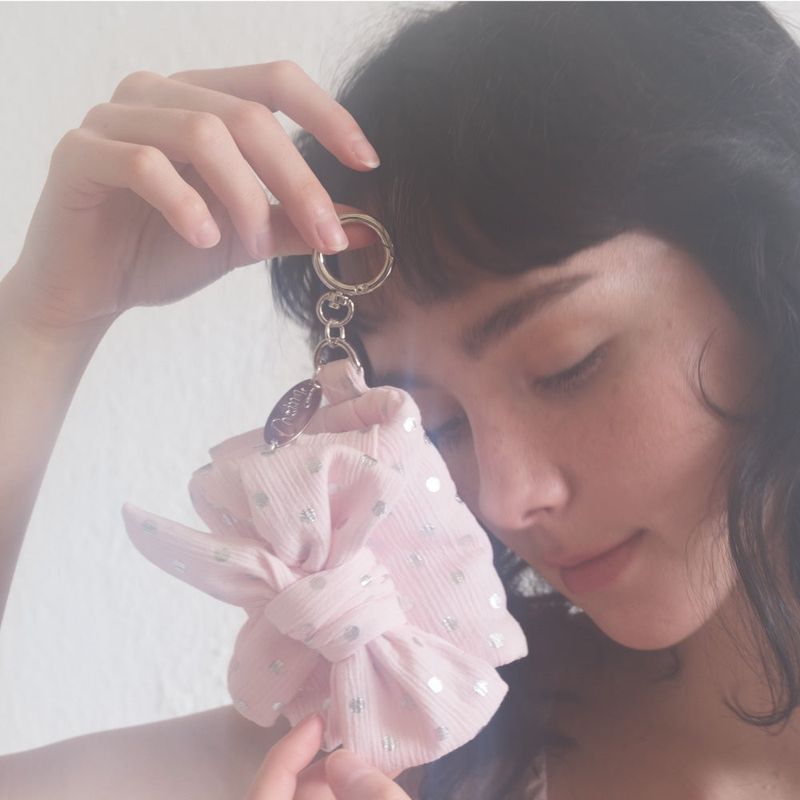 cozing（コジング）の「リボンウォレット_ドットピンク（スマホグッズ/小物）」