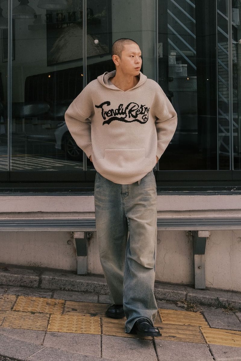 GUBIN(グビン)の「RE: ウェーブ ロゴ ニット フーディー - アイボリー(トップス)」