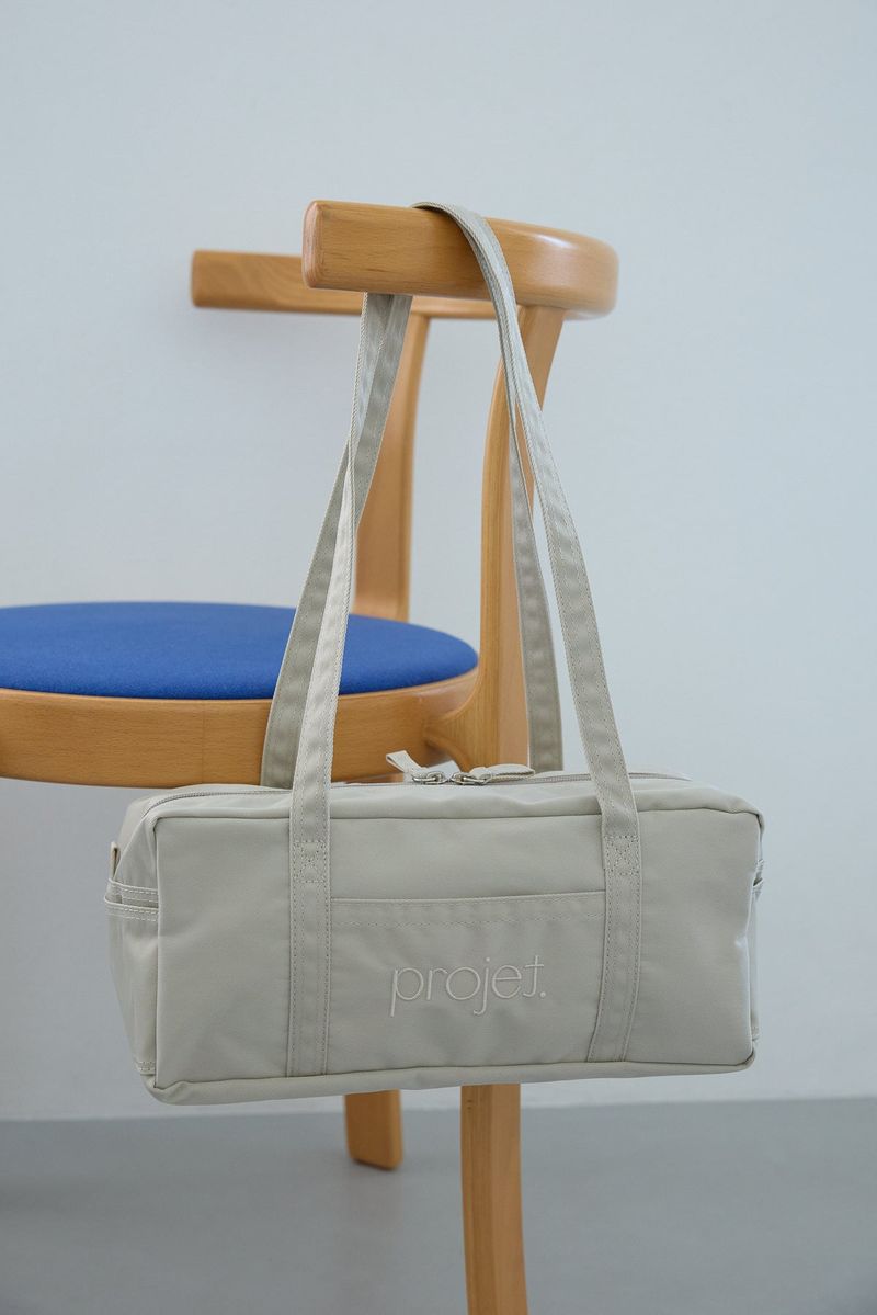 compact duffle bag (light beige)